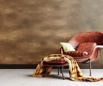 Living room dark grey interior wall mock up with cognac brown co