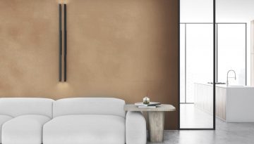 White living room with sofa and poster