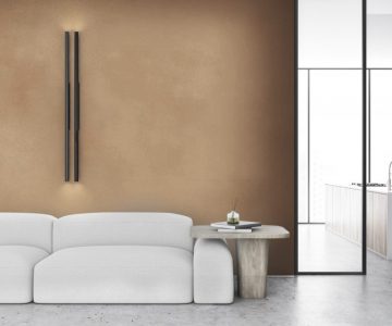 White living room with sofa and poster