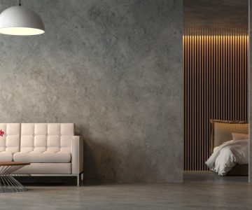 Loft style liveng room and bedroom with polished cocrete 3d render,Furnished with fabric furniture,Decorate wall with wood lattice.